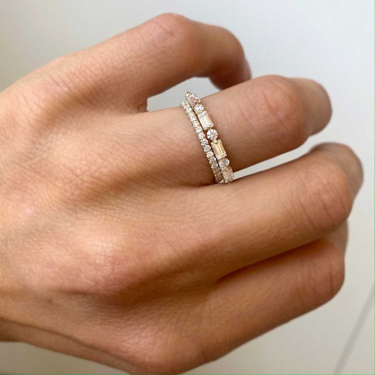 Item Details: Four baguette diamonds approx. 0.37 ctw. (G/VS). Five round diamonds approx. 0.15 ctw. (G/VS). Cast in your choice of 14K white, yellow, rose gold or platinum. Please allow 1-2 weeks for production and delivery. Moissanite Ring With Baguette Diamonds, White Moissanite Diamond Ring With Baguette Diamonds, White Round Cut Diamond Ring With Baguette Diamonds, Everyday White Diamond Ring With Accents, Diamond White Rings With Baguette Lab-grown Diamonds, Diamond White Diamond Ring With Baguette Diamonds, Diamond White Baguette Lab-grown Diamond Rings, Diamond White Baguette Diamond Ring, Diamond White Baguette Diamond Rings In Lab Grown Diamond