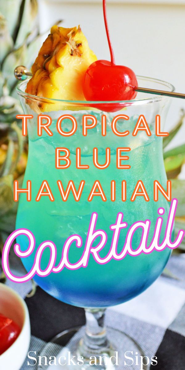 a tropical blue hawaiian cocktail with a cherry on top