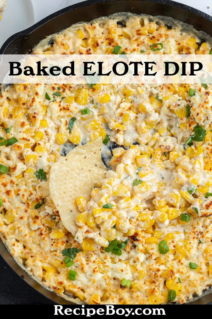 baked elotee dip in a cast iron skillet with tortilla chips