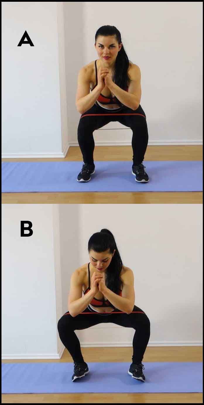 a woman is doing squats with her hands on her chest and the other side