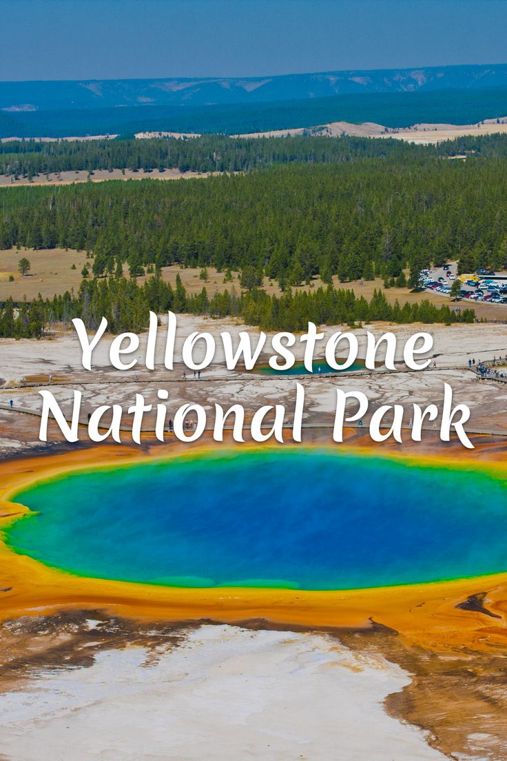 yellowstone national park with the words yellowstone in white overlaying it's blue and yellow colors