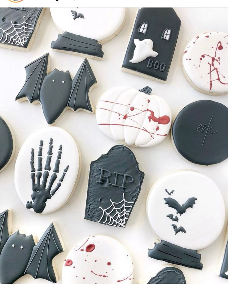 halloween cookies decorated with black and white icing