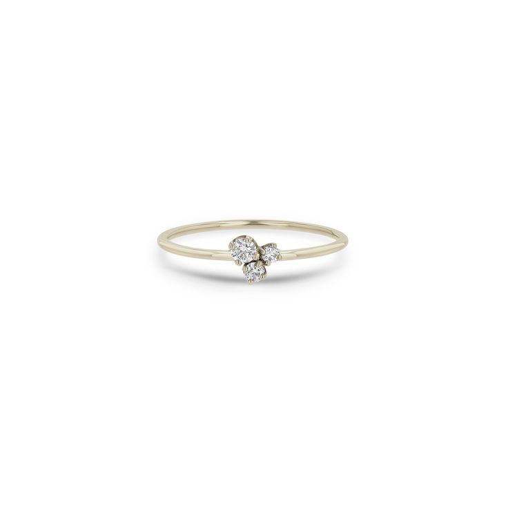 14k gold small mixed size prong set diamond trio ring SPECIFICS • band is approx. 1mm wide• diamond trio is approx. 5.5mm across• round diamonds are approx. 1.7mm, 2mm, & 2.4mm• white diamonds .10 ctw***Need a size not listed? Please email direct@zoechicco.com to submit your request, and we'll do our best to accommodate. We recommend you visit your local jeweler to get a professional measurement or order our complimentary ring sizer (US residents only) to determine your correct size. 14k Gold Cluster Diamond Ring, Yellow Gold Three Stone Diamond Ring For Promise, Promise Cluster Ring In 14k White Gold, 14k Gold Stackable Promise Rings With Diamond Accents, 14k Gold Cluster Ring With Single Diamond, 14k Gold Cluster Ring With Ethical Diamonds For Promise, 14k Gold Cluster Ring For Promise Occasions, Dainty Cluster Ring With Single Cut Diamonds For Promise, Fine Jewelry 14k Gold Cluster Promise Ring