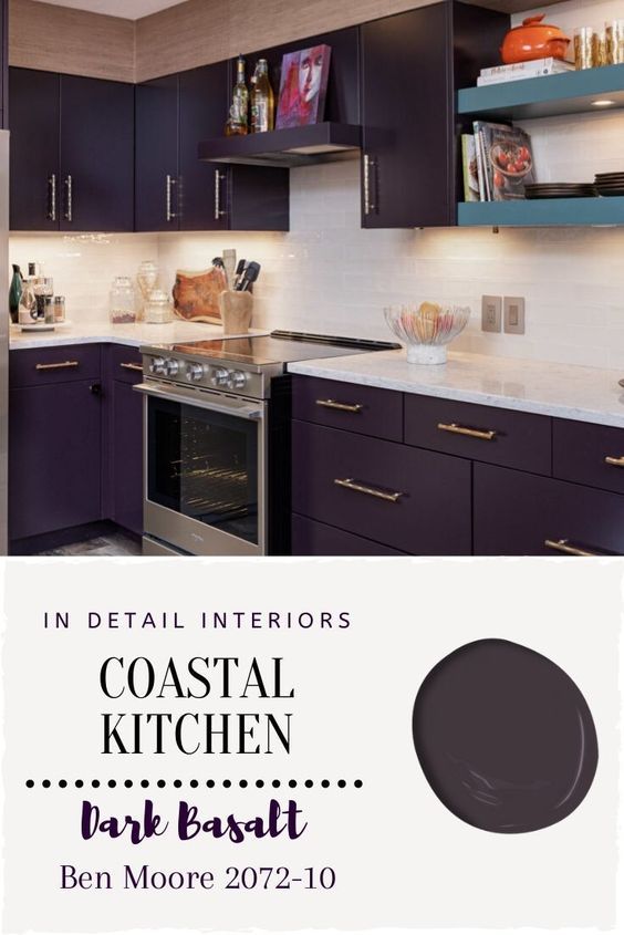 a kitchen with dark purple cabinets and white counter tops is featured in the magazine coastal kitchen