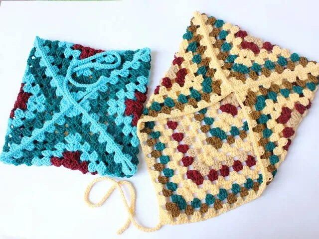 two crocheted squares sitting next to each other