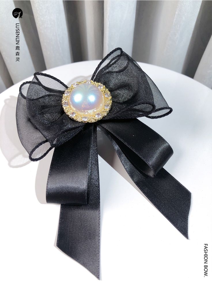 Attention: This price includes a brooch only, others are not included.Material: Alloy, ribbon.Size: 13*11cm.Hand measurement will have discrepancy of about 0.3cm.Weight: 20.6g. Gift Bow Brooch, Black Brooch With Decorative Bow Gift, Black Brooch With Decorative Bow As Gift, Black Ribbon Brooches As Gift, Black Ribbon Brooches For Gift, Elegant Black Ribbon Hair Accessories, Elegant Bow Hair Accessories As Gift, Elegant Hair Accessories With Satin Bow As Gift, Black Bow Tie Brooch For Wedding