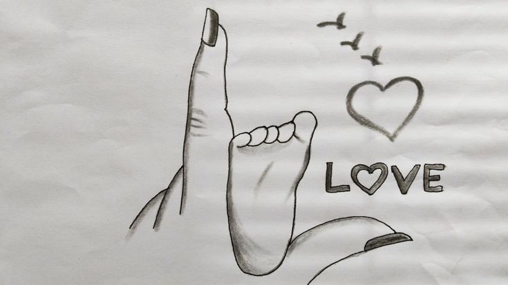 a drawing of a peace sign with the word love written on it and birds flying in the background