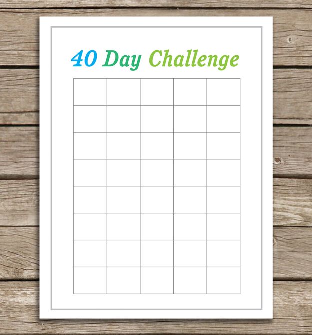 the printable 40 day challenge is displayed on a wooden table with an orange and green marker