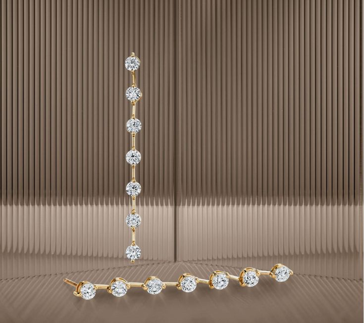 Finely crafted from 18K Gold with glittering, hand-selected diamonds along a sleek, elegant line drop silhouette, these diamond earrings are the perfect statement piece for any look. Enhance your collection with 3.36ct of pure luxury. Statement Pieces, Sleek, Diamond Earrings, 18k Gold, Glitter, Yellow Gold, Drop Earrings, Pure Products, Gold