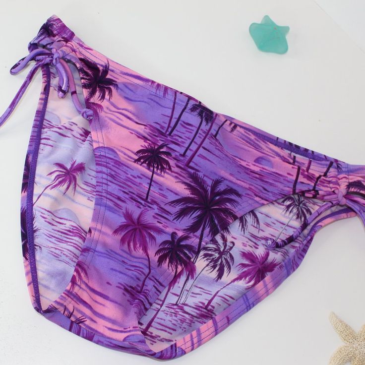 Bikini Bottoms With Palm Tree // Purple Bikini Super Pretty Bikini Bottoms With Palm Tree Design Tag Says Size 9/10 Brand New Never Worn Purple Beachwear Bottoms For Beach Party, Purple Tie-side Bottom Swimwear For Swimming, Purple Tie-side Swimwear For Swimming, Purple Beachwear Swimwear For Vacation, Purple Swimwear For Pool Vacation, Tropical Brief Swimwear For Beach, Purple Tropical Swimwear For Poolside, Tropical Purple Swimwear For Pool, Purple Tie-side Bottom Swimwear For Beachwear