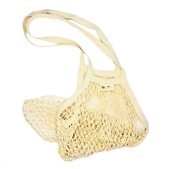 a white net bag is shown against a white background and has a strap around it