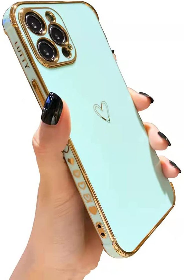 a woman's hand holding an iphone case with a heart on it