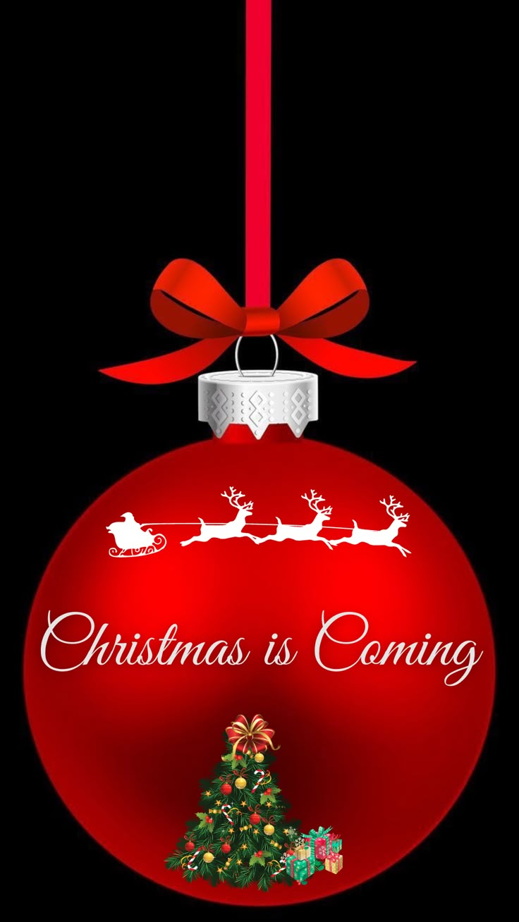 a red christmas ornament with santa's sleigh on it and the words christmas is coming