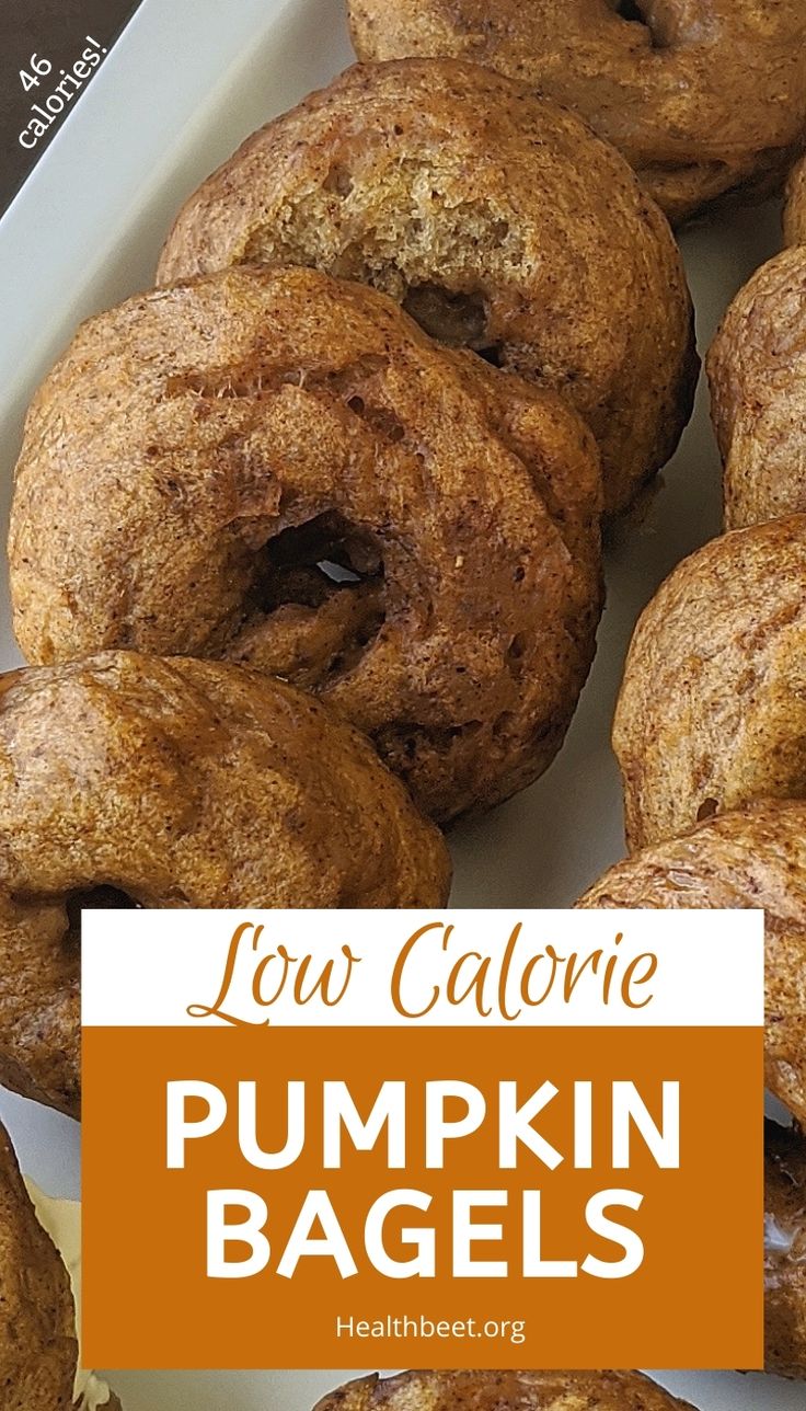 low calorie pumpkin bagels in a box with text overlay that reads low calorie pumpkin bagels