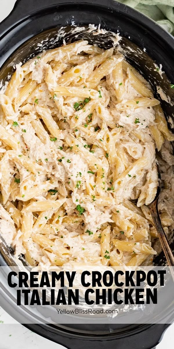 creamy crockpot italian chicken in a slow cooker with text overlay that reads, creamy crockpot italian chicken