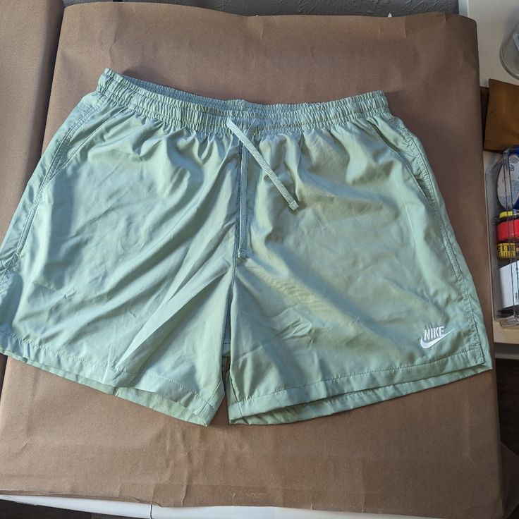 Brand: Nike Waist: 17.5" Hips: 25" Thigh: 16" Leg Opening: 14.5" Inseam: 5.5" Rise: 14" Length: 17" Color: Light Green Condition: New With Tags Used Items May Have Signs Of Wear. However, I Try My Best To Include Plenty Of Photos To Help Buyers See Any Issues/Damage/Or Wear Found On The Items. If You Have Questions, Please Reach Out Before Sending An Offer Or Purchasing An Item. I Value Your Time And Want To Make Sure You Are Completely Aware Of What You Are Purchasing. All Sales Are Shipped Out Nike Athletic Shorts With Pockets For Summer, Nike Summer Athletic Shorts With Pockets, Nike Athleisure Shorts For Summer, Nike Athleisure Summer Shorts, Nike Summer Athleisure Shorts, Nike Athletic Shorts For Summer, Nike Summer Athletic Shorts, Nike Summer Athletic Shorts With Elastic Waistband, Nike Beach Shorts With Elastic Waistband