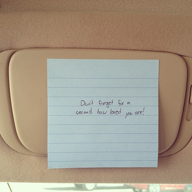 a note attached to the back seat of a car with writing on it that says don't forgets so a reward has been you are