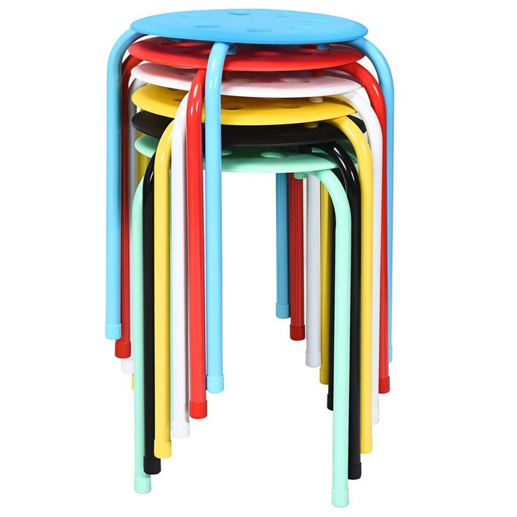 multicolored plastic stools stacked on top of each other