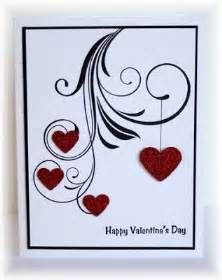 a valentine's day card with hearts hanging from strings