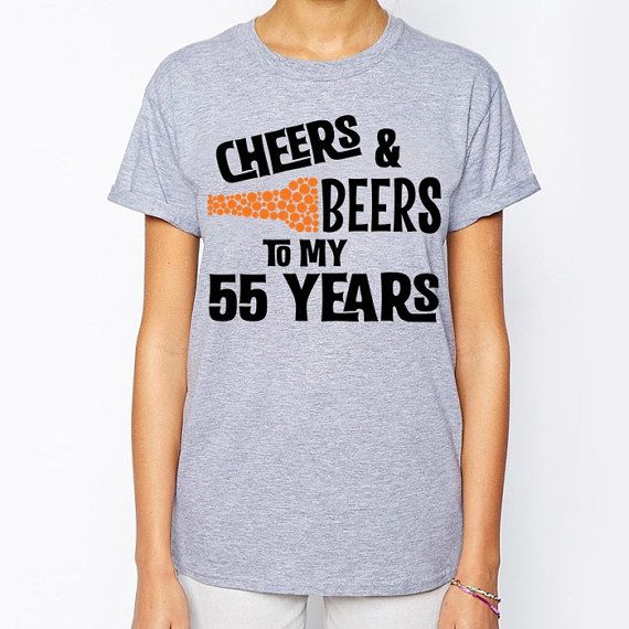 a woman wearing a t - shirt that says cheers and beers to my 37 years