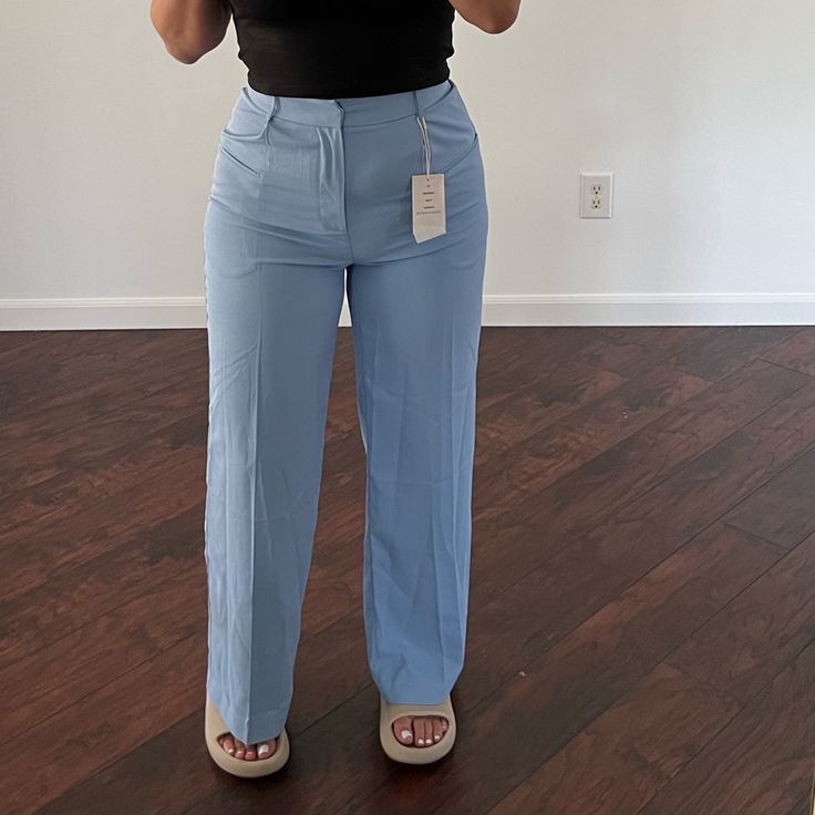 Brand New Trousers. I’m 5’6 For Reference. Light And Flowy Material High Rise Bottoms For Business Casual Summer, Business Casual High-rise Summer Bottoms, Casual Blue Pants For Office, Casual Blue Pants For The Office, Light Blue Pants For Spring Day Out, Light Blue Wide Leg Workwear Bottoms, Light Blue Wide Leg Bottoms For Work, Casual Blue Bottoms For Office, Wide Leg Light Blue Bottoms For Workwear