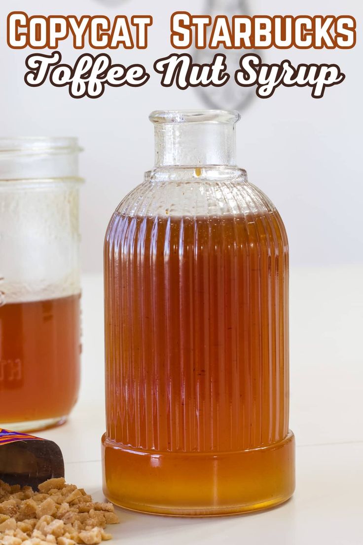 a bottle of coffee nut syrup next to a jar of starbuck's tea