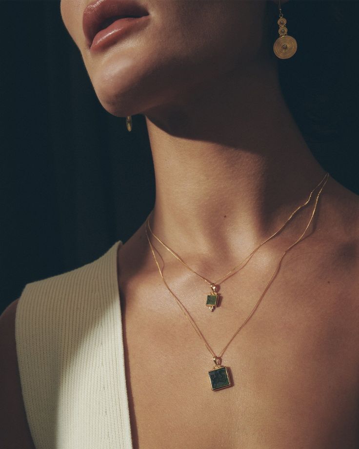 The Anu Pegasus Necklace, in 22k solid gold, features a hand carved olive-green onyx intaglio with a winged horse motif in reference to mythical Pegasus. Flanking the bail is delicate gold beading, ubiquitous to ancient Anatolian and Hellenistic jewellery.  A 22k hallmark is stamped onto the rear of the stone casing. A 14k gold diamond cut cable chain completes this piece. Luxury Engraved Jade Jewelry, Formal Gold Jade Necklaces, Formal Gold Jade Necklace, Luxury Amber Necklace With Polished Finish, Luxury Yellow Gold Jade Necklaces, Elegant Yellow Gold Agate Jewelry, Luxury Yellow Gold Jade Necklace, Polished Yellow Gold Jade Jewelry, Minimalist Gold Jade Jewelry