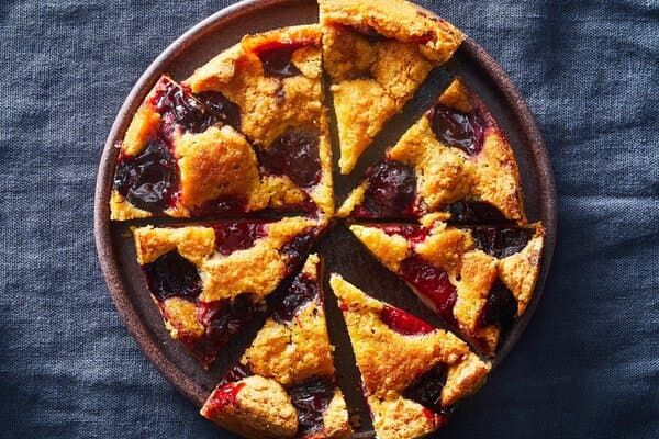 a pie with slices cut out on a plate