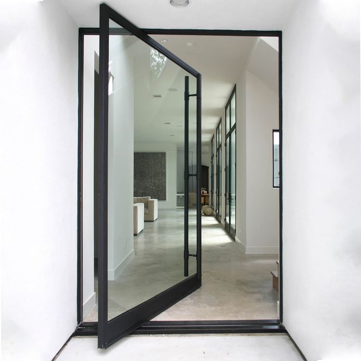 gloryirondoors home type black iron pivot door with clear glass Pivot Doors Entry, Hall Door, Door Architecture, Pivot Door, Modern Entry, Entry Design, Glass Walls, Pivot Doors, Glass Front Door