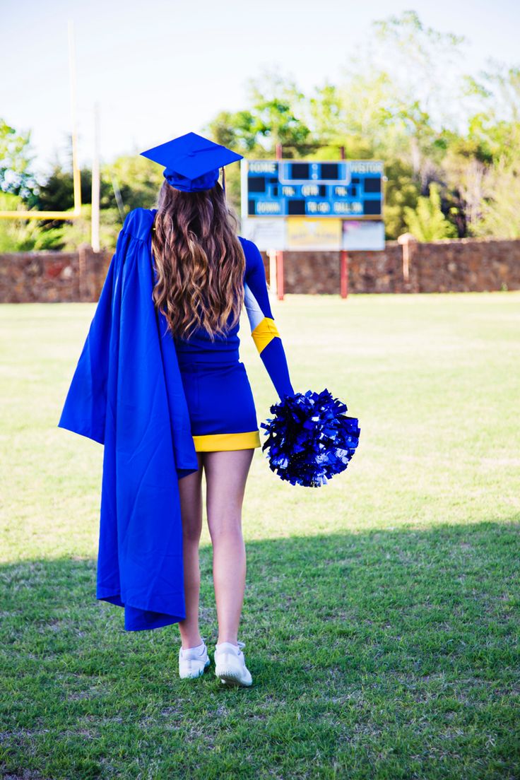 Cheer uniform with cap and gown. One last walk on the field. Senior Pictures At High School, Cheer Portraits, Pretty Senior Pictures, Cheerleading Senior Pictures, Cheerleading Picture Poses, Softball Photos, Cute Senior Pictures, Grad Poses, Cheer Photography