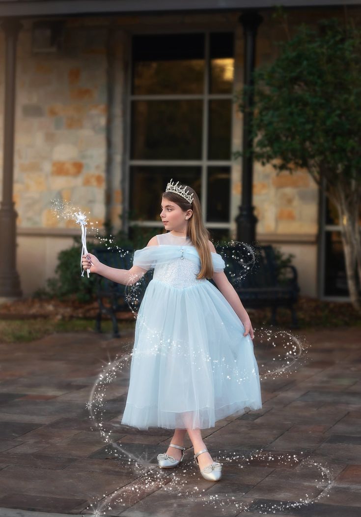 She will be the fairest in all the land in this darling blue princess dress. Full of details and whimsy, this is not your average costume. Incredible quality and a perfect keepsake for years to come. Don't forget to add our tiara and our wand for just the right accessories for the princess! These are soft and never scratchy, we understand tactile sensitivity and always design using the softest materials, then we fully line the dresses with soft cotton. NO GLITTER is ever used on ANY of our produ Blue Fairytale Princess Dress For Dress-up, Fairytale Tulle Fairy Dress For Pageant, Fairytale Tulle Fairy Dress For Pageants, Blue Princess Ball Gown Dress, Blue Princess Style Ball Gown Dress, Blue Princess Fairy Dress For Costume Party, Blue Princess Ball Gown For Fancy Dress, Fairytale Princess Dress For Pageant, Blue Fairytale Princess Dress For Costume Party