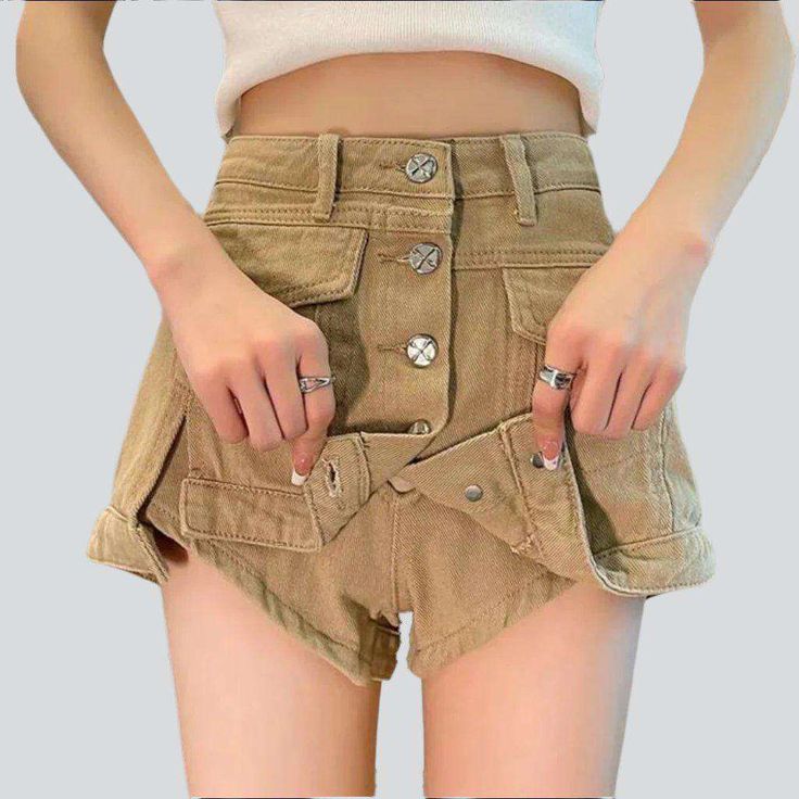 Discover the epitome of summer elegance with our layered buttoned denim skort from our 2023 Summer Collection—featuring a high-waist. patchwork and buttoned closure. this fashion-forward piece is the perfect blend of vintage allure and today's spirited fashion pulse!Why This Skort is a Summer FantasyExperience the ultimate summertime look with a piece that effortlessly infuses bygone elegance into modern-day sophistication. Its high-waist and patchwork design beckons summer's warm. gentle caress High Waist Denim Skirt With Belt Loops For Summer, Summer Cotton Denim Skirt With Button Closure, Spring Cotton Button-up Shorts, Spring High-waisted Denim Skirt With Built-in Shorts, Summer Short Denim Skirt With Pockets, Spring Button-up Cotton Shorts, Chic Summer Denim Skirt With Pockets, Chic Cotton Jean Shorts With Pockets, Cotton Button-up Jeans For Summer