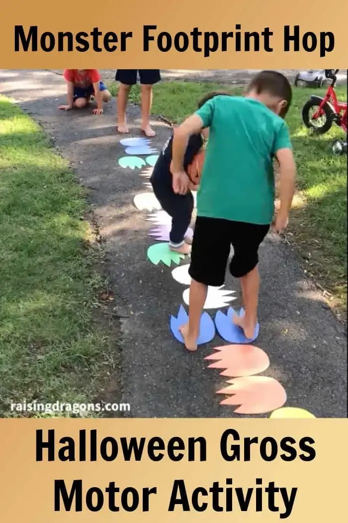 two young boys playing with paper plates on the sidewalk, and text reading monster footprint hop halloween gross motor activity