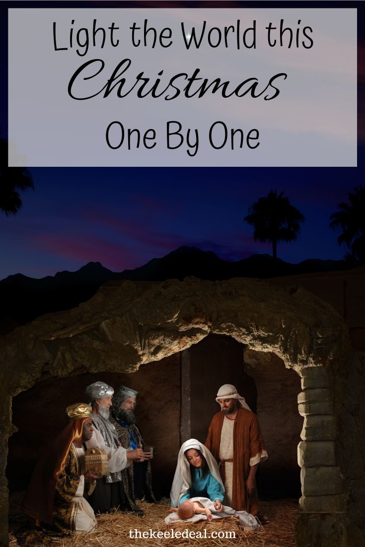 the nativity scene with text that reads, light the world this christmas one by one