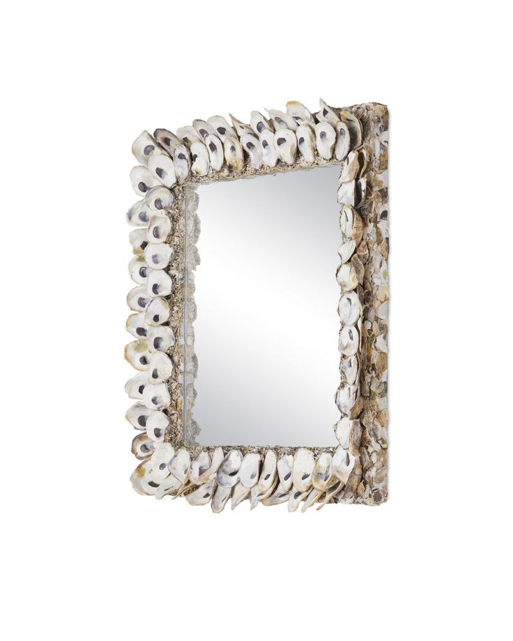 a mirror that has shells on it and is in the shape of a square frame