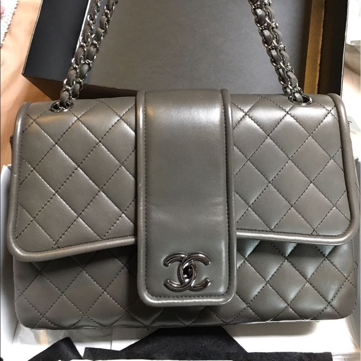 New With Tags (Not Attached) Grey Chanel Flap Bag. Used 3-4 Times. Comes With Box, Bag, Authenticity Card, And Receipt. Bought From Chanel At Saks In St Louis. Price Is Firm. No Trades! High-end Double Flap Shopping Bags, High-end Double Flap Shoulder Bag For Shopping, Luxury Office Bag With Double Flap, Elegant Double Flap Bag With Dust Bag Included, Designer Evening Bag With Flap, High-end Double Flap Bag With Removable Pouch, Luxury Double Flap Shoulder Bag For Office, Designer Double Flap Bag For Everyday Luxury, Designer Double Flap Bag For Shopping