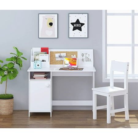 a white desk and chair in a room