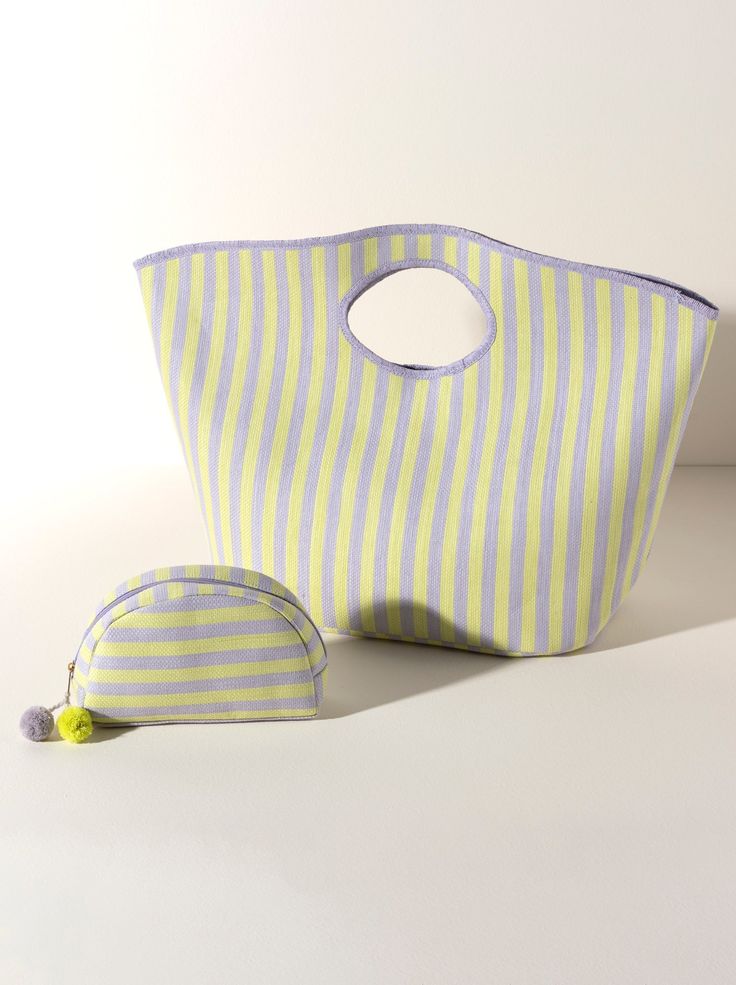 Update your summer essentials with Shiraleah’s Lolita Tote. This tote features a lively lime and lilac striped pattern and lilac trim, making it the perfect pool accessory, or addition to neutral outfit. Measuring L 25.5" × W 9" × H 17.5", and made from paper, the Lolita Tote fits all of your essentials and more, giving it the balance of style and practicality. Pair with the matching Lolita Zip Pouch or other items from the Shiraleah collection to complete your summer look! Color: Lime L 25.5" X Green Summer Beach Bag For Poolside, Summer Vacation Beach Bag With Striped Lining, Green Beach Bag For Spring, Striped Beach Bag For Summer Vacation, Summer Vacation Striped Beach Bag, Purple Summer Vacation Bags, Purple Beach Bag For Spring, Spring Beach Bag In Purple, Purple Bags For Spring Vacation