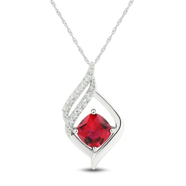 A beautiful cushion-cut lab-created ruby shines at the center of this sterling silver necklace for her. Swirls of round-cut white lab-created sapphires shimmer above to finish the look. The pendant sways from an 18-inch rope chain and secures with a lobster clasp. Sterling Silver Necklace With Diamond Accents, Cushion Cut Diamond Accents Necklace For Gift, Sterling Silver Necklace With Cushion Cut Diamond Accents, Sterling Silver Jewelry With Cushion Cut Gemstone Accents, White Gold Cushion Cut Jewelry With Gemstone Accents, Cushion Cut Ruby Jewelry As Gift, Silver Cushion Cut Jewelry With Gemstone Accents, Lab-created Ruby Jewelry With Diamond Accents, Gift Jewelry With Diamond Accents And Lab-created Ruby