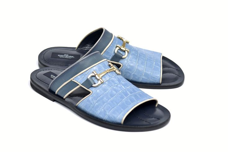 Style: 5827-Blue Unique slip-on Sandal from the Corrente collection in Crocodile Printed Calfskin features Perforated Calfskin Trim, Horsebit Hardware Detail, a Padded Footbed and a full Leather Sole!  Matching Belt Available. Luxury Slide Mules, Luxury Leather Summer Slippers, Luxury Leather Sole Slide Mules, Luxury Open Toe Slippers With Branded Insole, Luxury Slip-on Summer Slippers, Luxury Leather Slides For Formal Occasions, Luxury Summer Slip-on Slippers, Luxury Blue Mules, Luxury Leather Sole Slip-on Slides