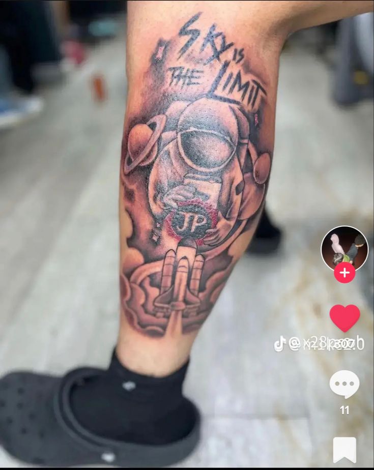 a person with a tattoo on their leg that says, i'm the limit up