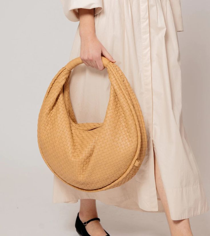 Santiago Hobo Bag | Cleobella Natural Hobo Bag With Detachable Handle For Daily Use, On-the-go Natural Hobo Shoulder Bag, Versatile Top Handle Baguette Bag For Everyday Use, Versatile Satchel With Round Handle For Daily Use, Versatile Handheld Shoulder Bag With Leather Handles, Versatile Natural Hobo Tote Bag, Leather Satchel Baguette Bag With Braided Handles, Leather Baguette Bag With Braided Handles In Satchel Shape, Handheld Hobo Bag With Braided Handles For Daily Use