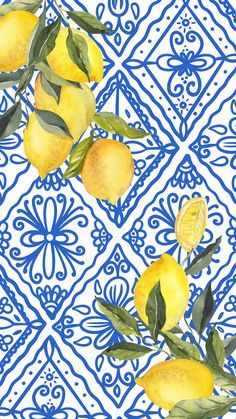 a blue and white tile with lemons on it