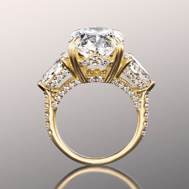 a three stone diamond ring on a reflective surface