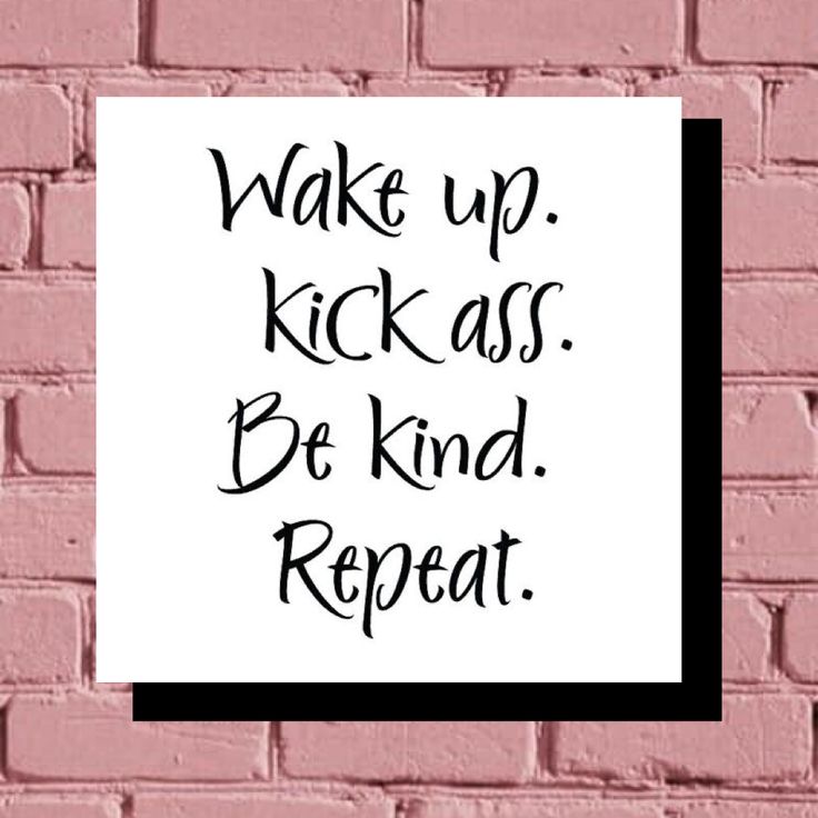 a sign that says wake up kickass be kind repeat on a pink brick wall