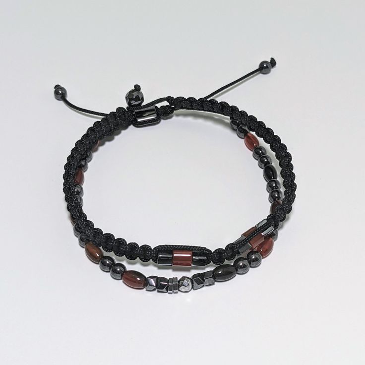 High-End Gray Hematite & Red Agate Bracelet Gray hematite is believed to provide grounding and protection Red agate is believed to provide protection token against negative energies and helps bring the calmness over you Simple contemporary design Weight: 10.9 grams for both together Bead size: 4 mm Braided cord bracelet size - 7.5 inches inner length (NOT ADJUSTABLE & NOT STRECHABLE) Combine hematite & red agate bracelet in adjustable macrame knot Adjustable range: One size fits most In set of 2 Adjustable Carnelian Bracelet As A Gift, Adjustable Carnelian Bracelet Perfect For Gifts, Adjustable Agate Beaded Bracelets, Adjustable Red Agate Beaded Bracelets, Red Agate Adjustable Beaded Bracelets, Adjustable Red Agate Beaded Bracelet, Adjustable Red Agate Crystal Bracelet, Adjustable Agate Beaded Bracelets In Holistic Style, Healing Hematite Bracelets With Natural Stones