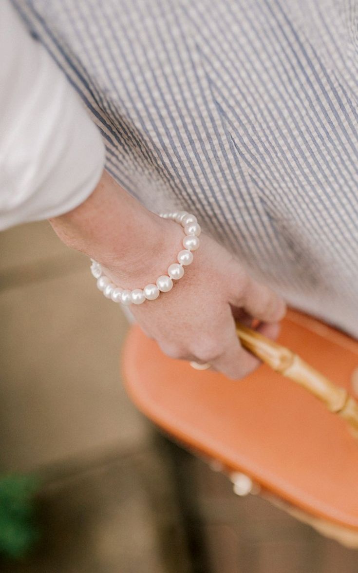 Add a touch of class to any outfit with this elegant freshwater pearl bracelet just like style expert Kelly Larkin of Kelly in the City did. This everlasting bracelet features 7 1/2″ of 8-8.5mm cultured freshwater pearls that have been hand-matched for quality, luster and sheen. Secured by a 14k white gold clasp, this gorgeous bracelet is timeless. Affordable Pearl White Bracelet For Gifts, Luxury Pearl Charm Bracelet For Anniversary, Luxury Minimalist Pearl Bracelets, Cheap White Classic Pearl Bracelet, Luxury Single Strand Pearl Bracelet, Elegant Style, Luxury Formal Pearl Bracelet With Sterling Silver Clasp, Luxury Metal Pearl Bracelet Perfect For Gifts, Luxury White Gold Pearl Bracelet In Fine Jewelry Style, Cheap Pearl Bangle Bracelet As Gift