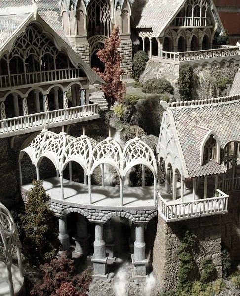 this is a model of a castle with lots of windows and arches on the roof