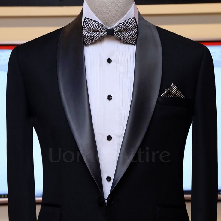 Description Here are the product design details black customized tuxedo two piece suit. Jacket Design FABRIC : 100% Woolen Fabric FITTING STYLE : Slim Fit Tuxedo LAPEL STYLE : Satin Shawl Lapel CHEST POCKET : Pocket Square LOWER POCKET : Double Flapped Pockets NO OF BUTTONS : Single Button SLEEVE BUTTONS : Four Buttons FUNCTIONAL SLEEVE BUTTON HOLES : No BUTTONS HOLE THREAD : Same Fabric BACK VENT STYLE : Double Vent LINING OPTIONS : Full Lined Trouser Design TROUSER STYLE : Slim TROUSER FRONT : Black Single Breasted Tuxedo For Party, Black Single-breasted Tuxedo For Black Tie, Black Single-breasted Tuxedo For Party, Black Single-breasted Party Tuxedo, Black Single Breasted Blazer For Wedding, Black Single-breasted Blazer For Wedding, Black Single Button Tuxedo For Black-tie Events, Black Single Button Tuxedo For Party, Black Single-button Tuxedo For Party