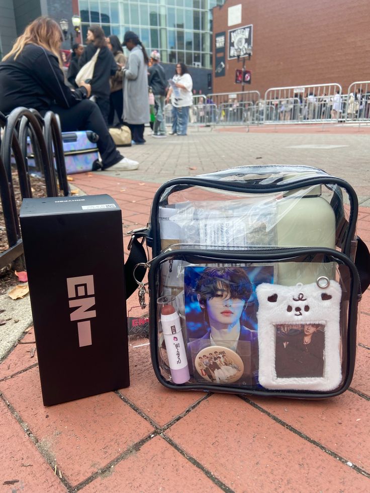 an open bag sitting on top of a brick sidewalk